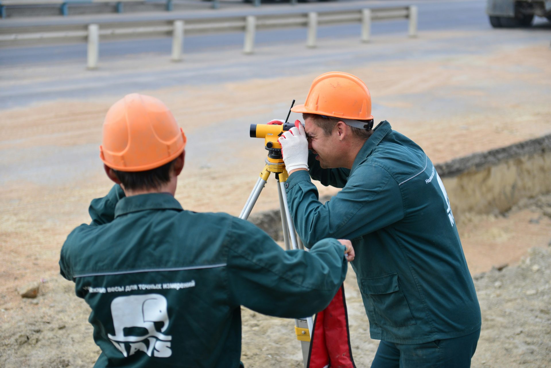 a couple of men standing next to each other